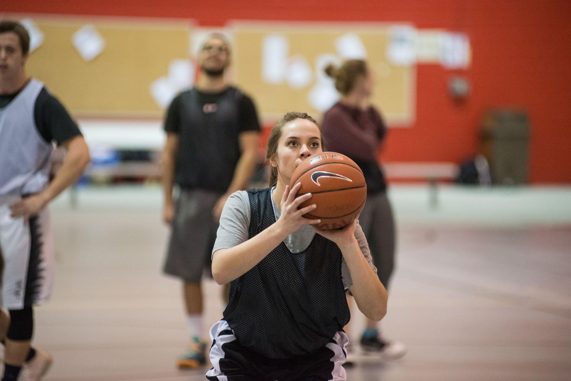 Photo of students playing intramural basketball